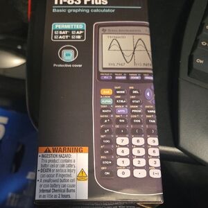 Texas Instruments TI-83 Plus Graphing Calculator - Black and Purple